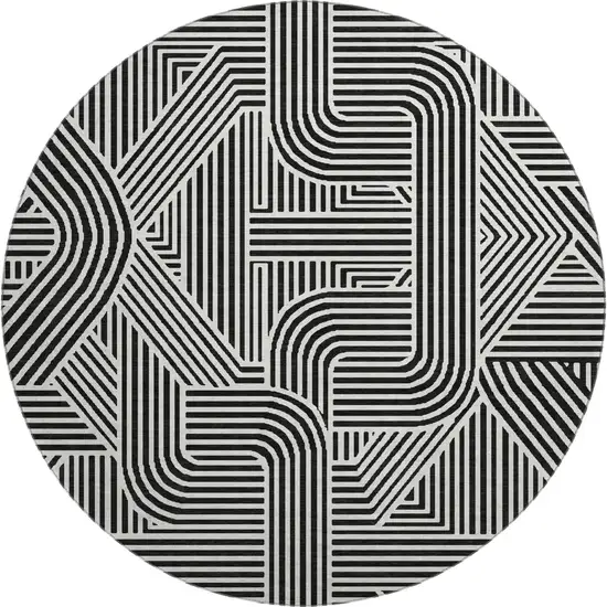 8' Black And Ivory Abstract Geometric Washable Round Rug With UV Protection Photo 1