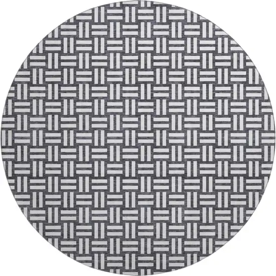 8' Black And Ivory Abstract Geometric Washable Round Rug With UV Protection Photo 1