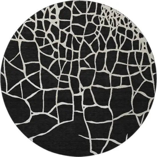 8' Black And Ivory Abstract Geometric Washable Round Rug With UV Protection Photo 3