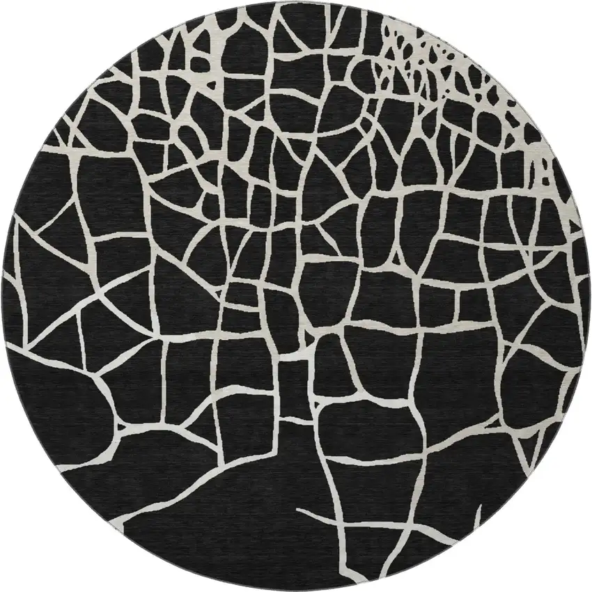 8' Black And Ivory Abstract Geometric Washable Round Rug With UV Protection Photo 3