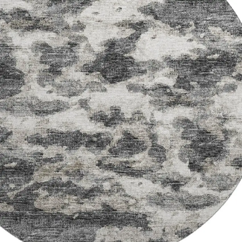 8' Black And Ivory Abstract Washable Round Rug With UV Protection Photo 6