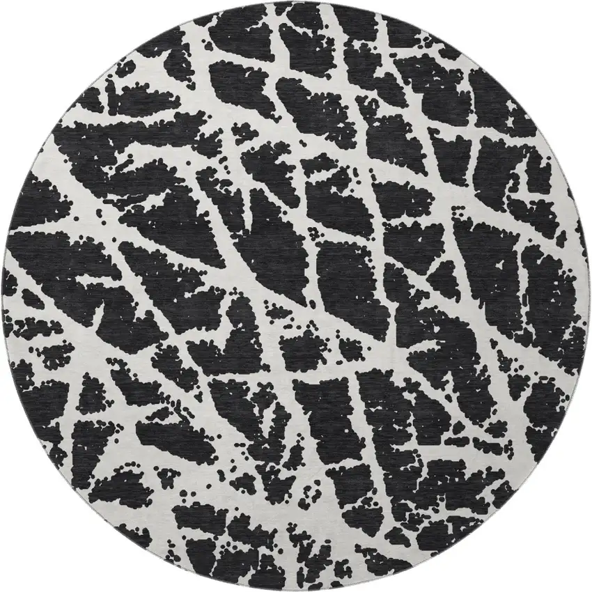 8' Black And Ivory Abstract Washable Round Rug With UV Protection Photo 4