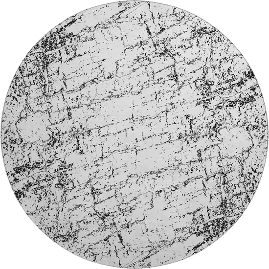 8' Black And Ivory Abstract Washable Round Rug With UV Protection Photo 1