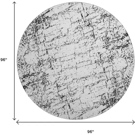 8' Black And Ivory Abstract Washable Round Rug With UV Protection Photo 9