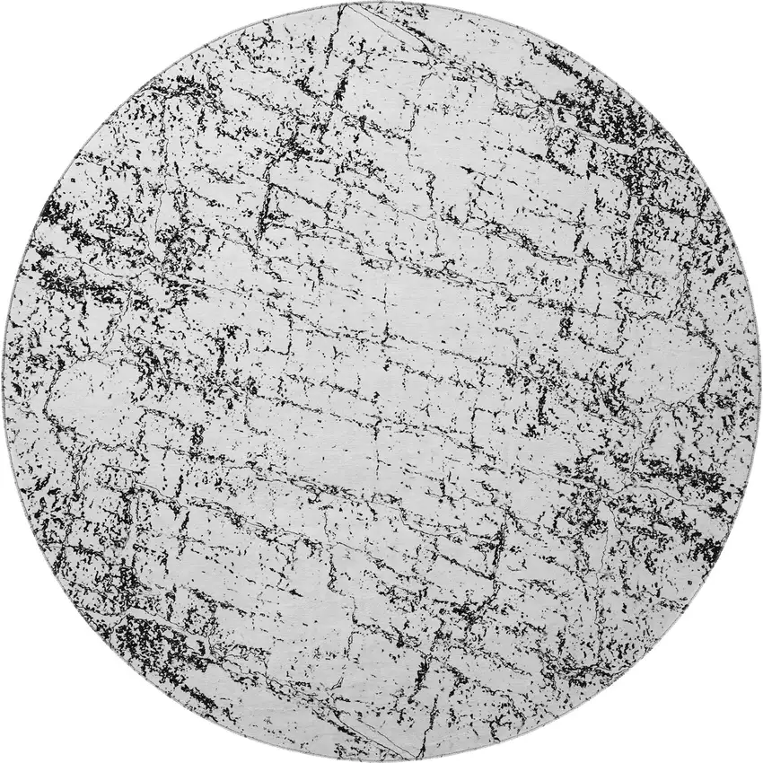 8' Black And Ivory Abstract Washable Round Rug With UV Protection Photo 3