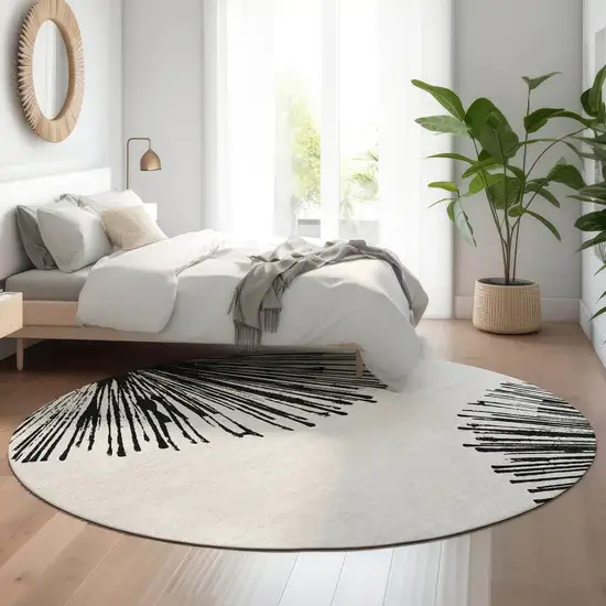 8' Black And Ivory Abstract Washable Round Rug With UV Protection Photo 5