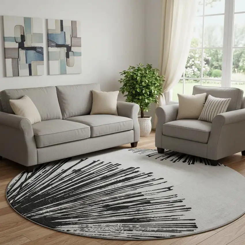 8' Black And Ivory Abstract Washable Round Rug With UV Protection Photo 1