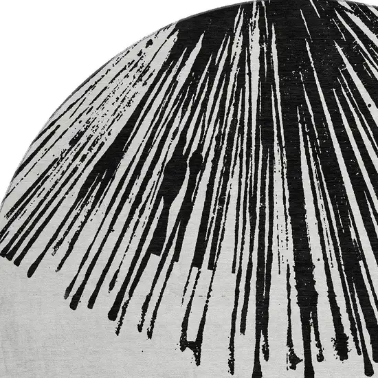 8' Black And Ivory Abstract Washable Round Rug With UV Protection Photo 3