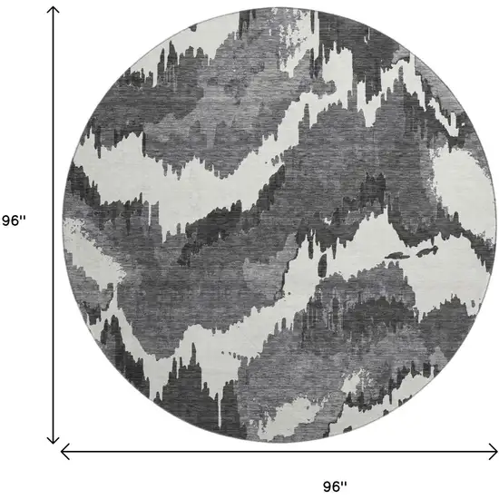 8' Black And Ivory Abstract Washable Round Rug With UV Protection Photo 3