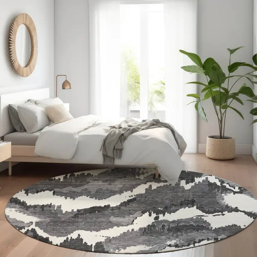 8' Black And Ivory Abstract Washable Round Rug With UV Protection Photo 6