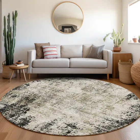 8' Black And Ivory Abstract Washable Round Rug With UV Protection Photo 4