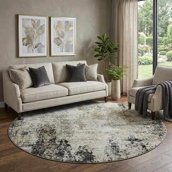 8' Black And Ivory Abstract Washable Round Rug With UV Protection Photo 1