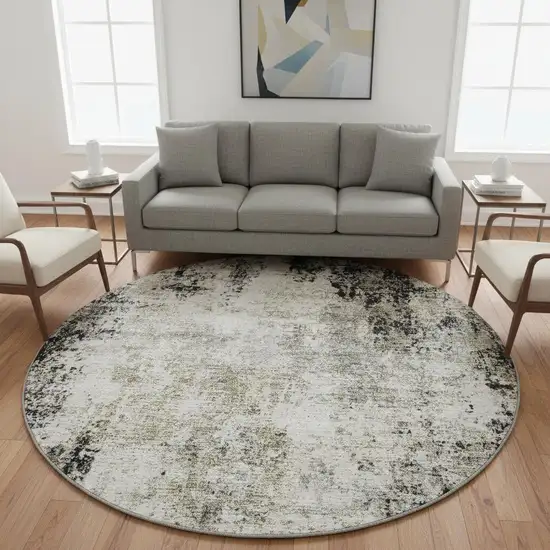 8' Black And Ivory Abstract Washable Round Rug With UV Protection Photo 2