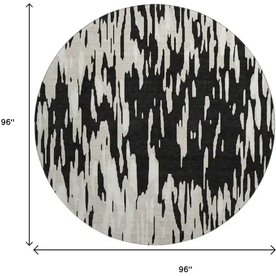 8' Black And Ivory Abstract Washable Round Rug With UV Protection Photo 7