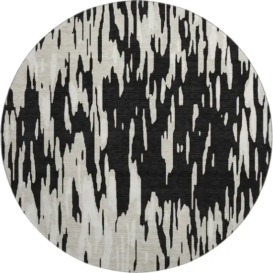 8' Black And Ivory Abstract Washable Round Rug With UV Protection Photo 1