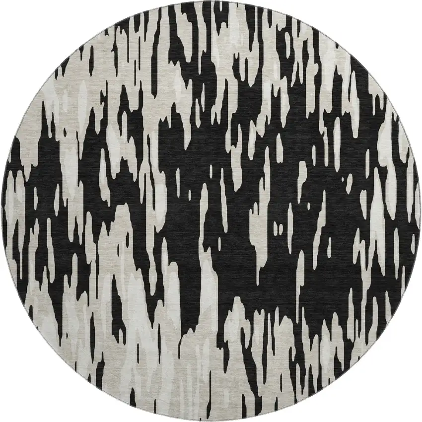 8' Black And Ivory Abstract Washable Round Rug With UV Protection Photo 1