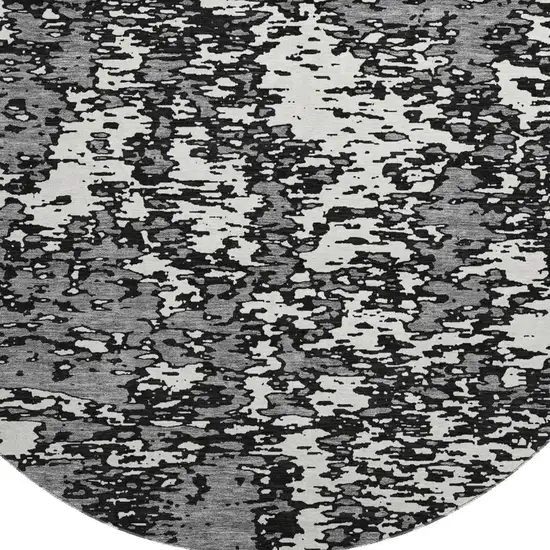 8' Black And Ivory Abstract Washable Round Rug With UV Protection Photo 3