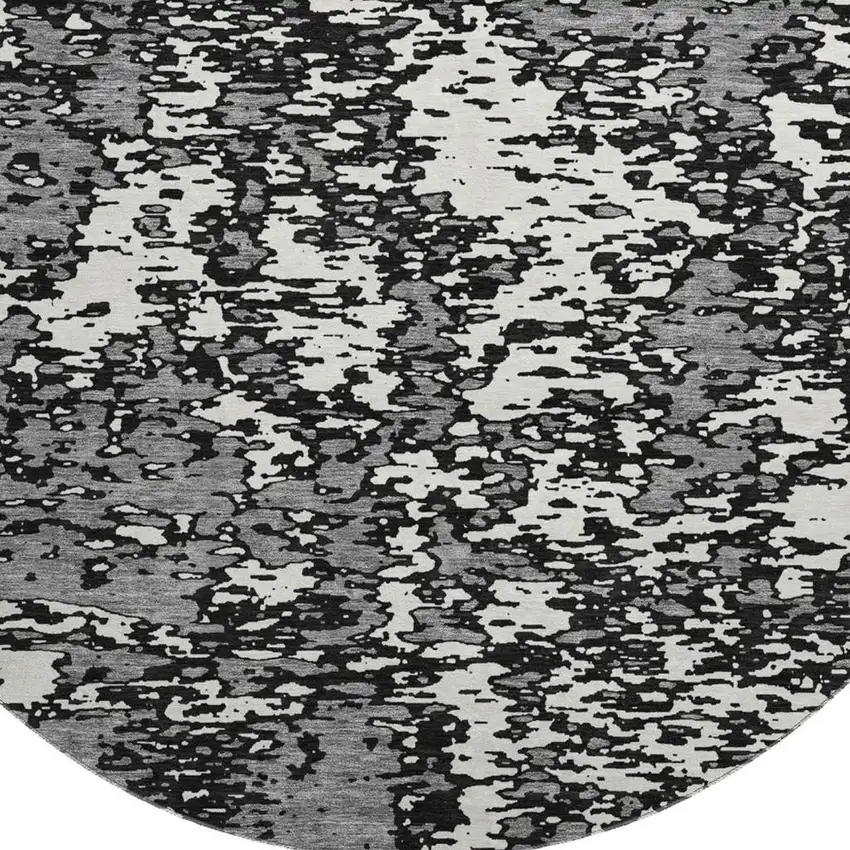 8' Black And Ivory Abstract Washable Round Rug With UV Protection Photo 3