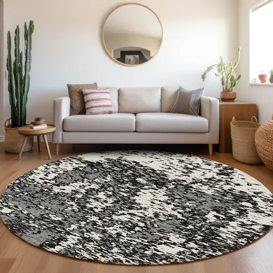 8' Black And Ivory Abstract Washable Round Rug With UV Protection Photo 4