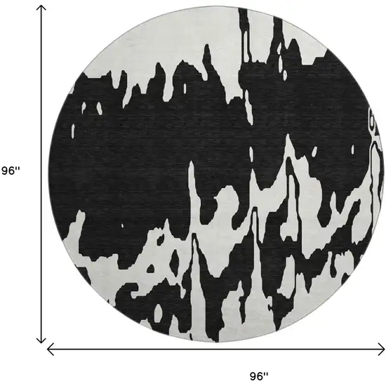 8' Black And Ivory Abstract Washable Round Rug With UV Protection Photo 8