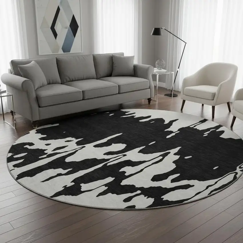 8' Black And Ivory Abstract Washable Round Rug With UV Protection Photo 2