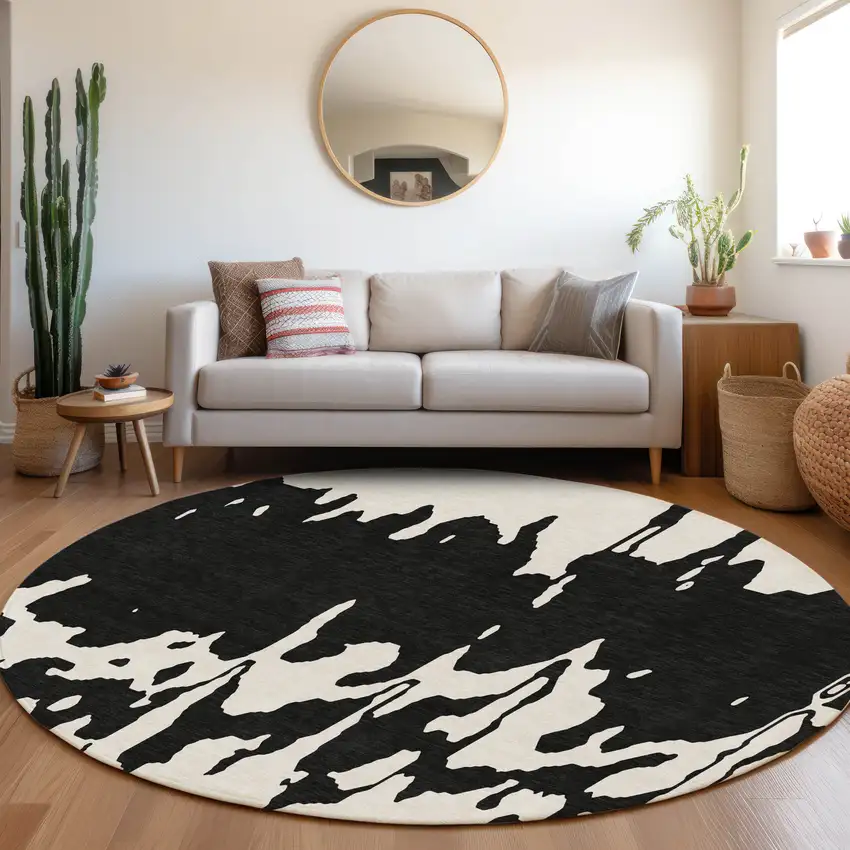8' Black And Ivory Abstract Washable Round Rug With UV Protection Photo 3