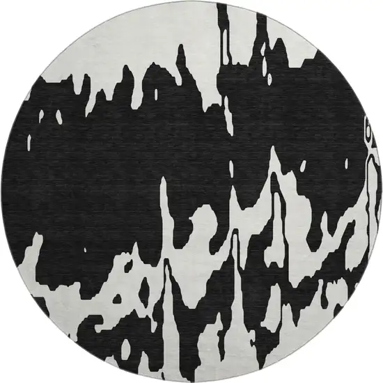 8' Black And Ivory Abstract Washable Round Rug With UV Protection Photo 1