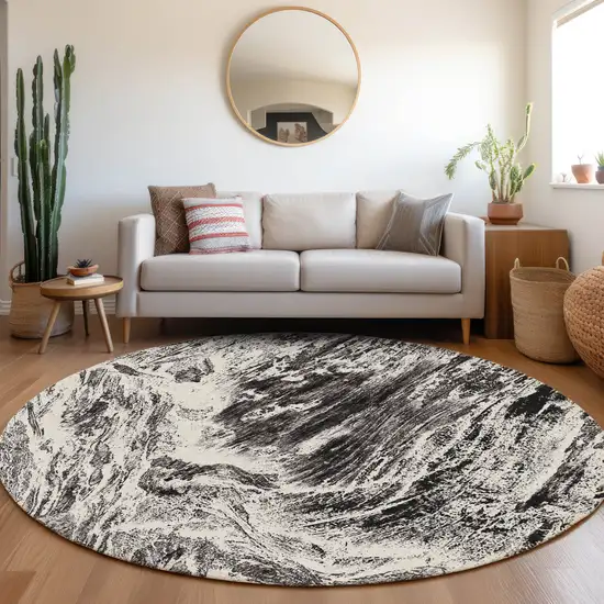 8' Black And Ivory Abstract Washable Round Rug With UV Protection Photo 4
