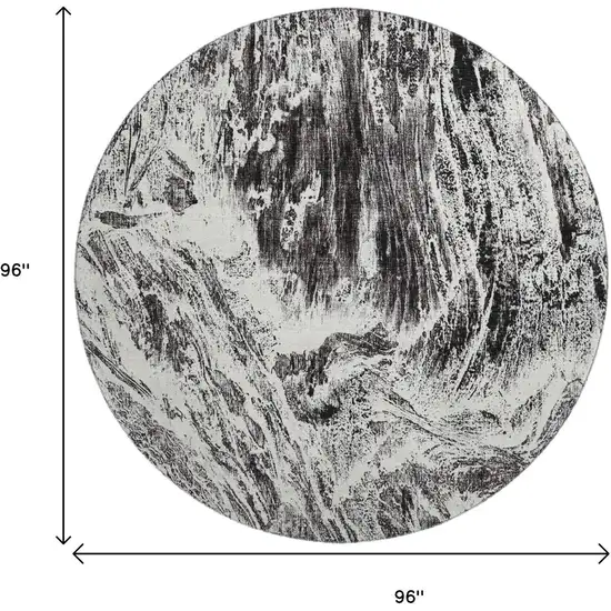 8' Black And Ivory Abstract Washable Round Rug With UV Protection Photo 9