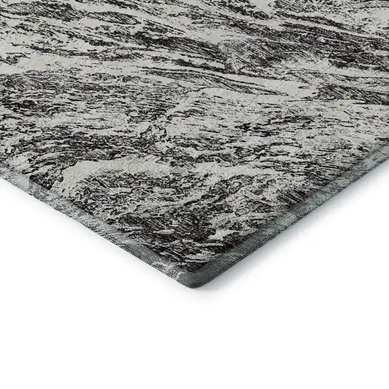 8' Black And Ivory Abstract Washable Round Rug With UV Protection Photo 6