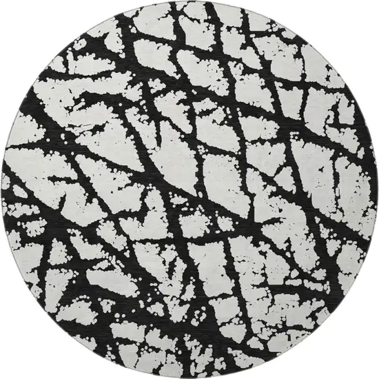 8' Black And Ivory Abstract Washable Round Rug With UV Protection Photo 3
