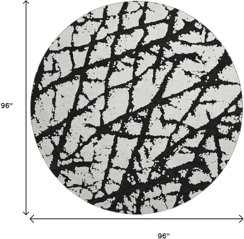 8' Black And Ivory Abstract Washable Round Rug With UV Protection Photo 9