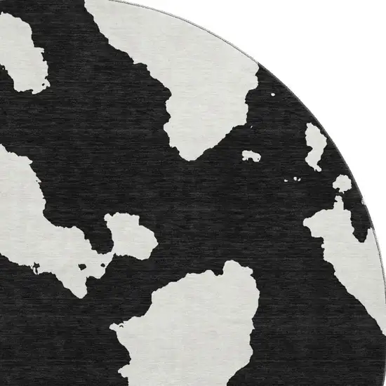 8' Black And Ivory Abstract Washable Round Rug With UV Protection Photo 2