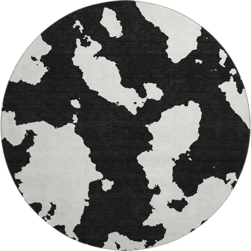 8' Black And Ivory Abstract Washable Round Rug With UV Protection Photo 1