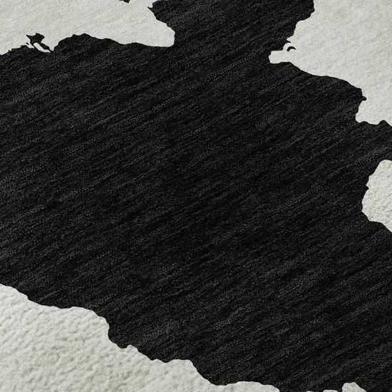 8' Black And Ivory Abstract Washable Round Rug With UV Protection Photo 8