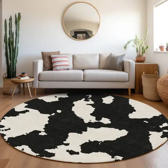 8' Black And Ivory Abstract Washable Round Rug With UV Protection Photo 4