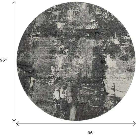 8' Black And Ivory Abstract Washable Round Rug With UV Protection Photo 9