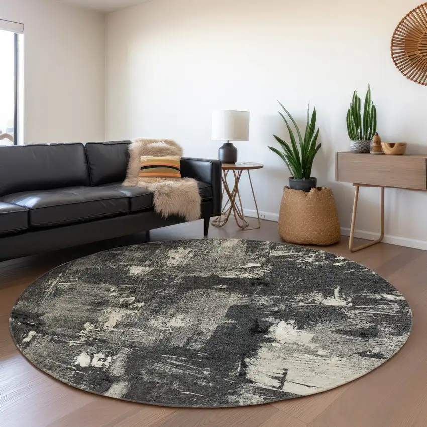 8' Black And Ivory Abstract Washable Round Rug With UV Protection Photo 4