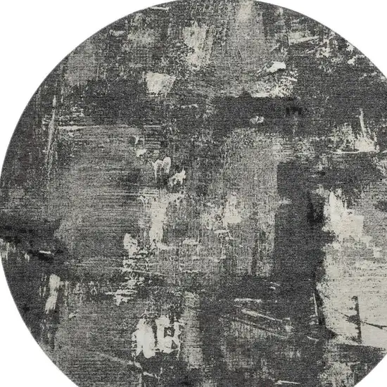 8' Black And Ivory Abstract Washable Round Rug With UV Protection Photo 2