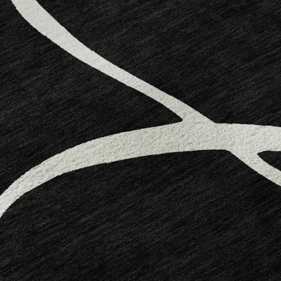 8' Black And Ivory Abstract Washable Round Rug With UV Protection Photo 8