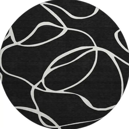 8' Black And Ivory Abstract Washable Round Rug With UV Protection Photo 3