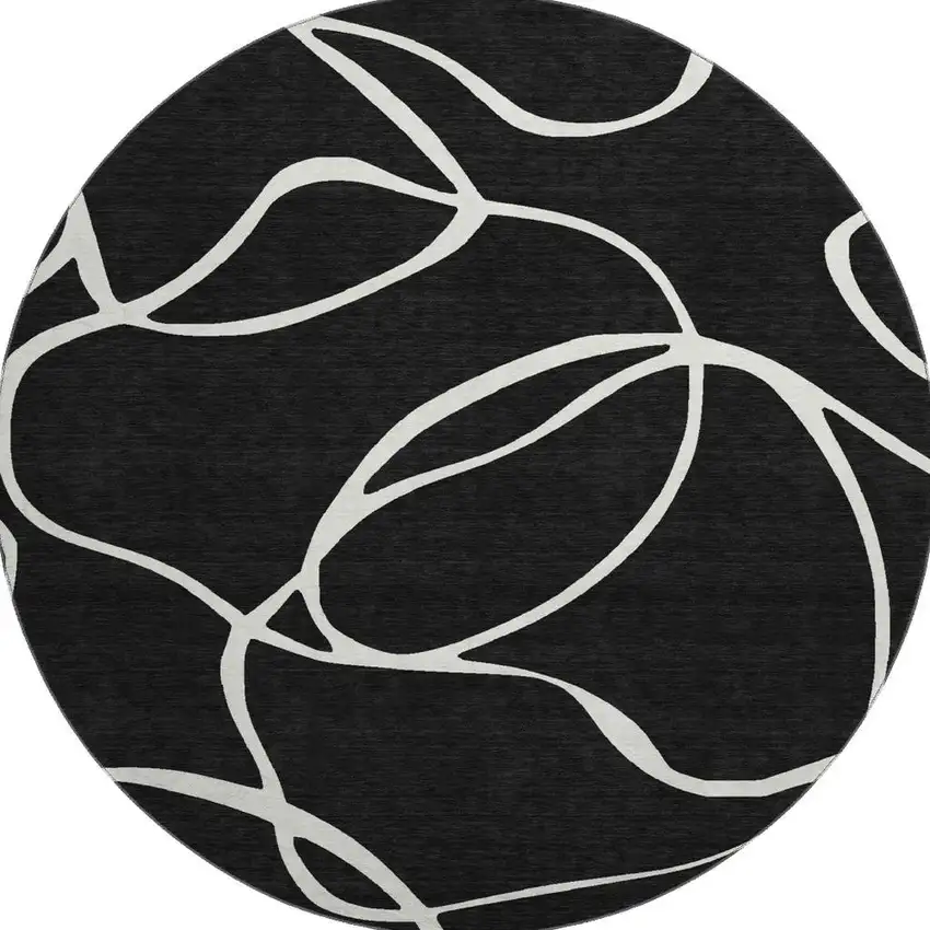 8' Black And Ivory Abstract Washable Round Rug With UV Protection Photo 3