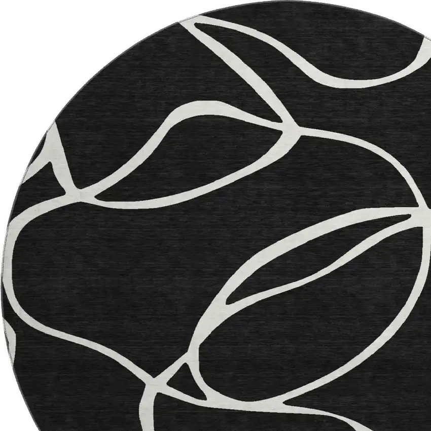 8' Black And Ivory Abstract Washable Round Rug With UV Protection Photo 2