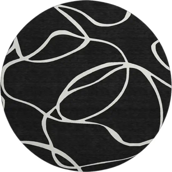 8' Black And Ivory Abstract Washable Round Rug With UV Protection Photo 1