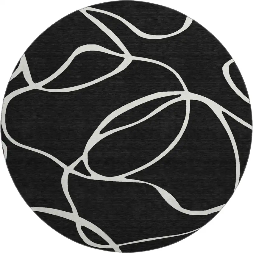 8' Black And Ivory Abstract Washable Round Rug With UV Protection Photo 1