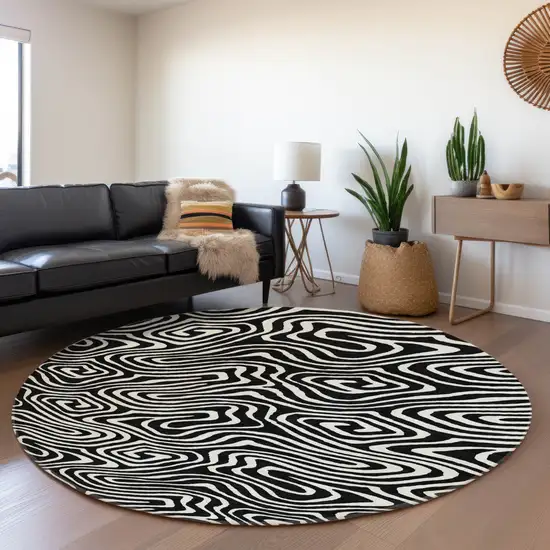8' Black And Ivory Abstract Washable Round Rug With UV Protection Photo 4