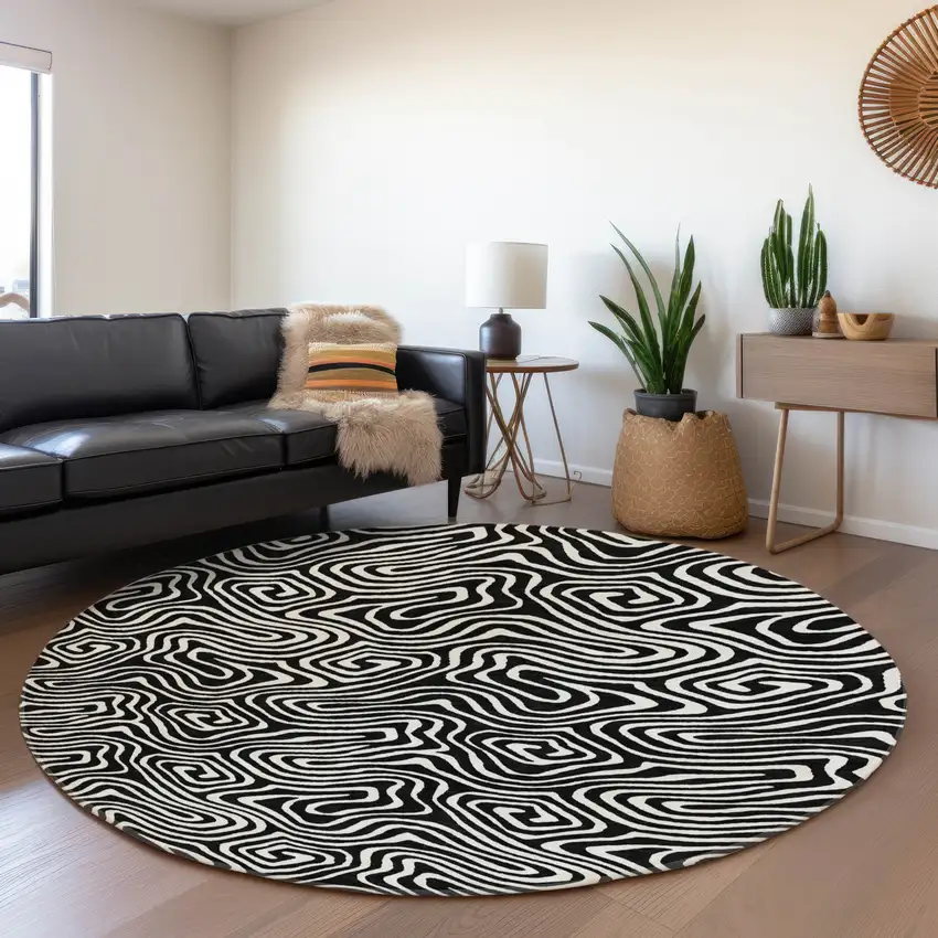 8' Black And Ivory Abstract Washable Round Rug With UV Protection Photo 3