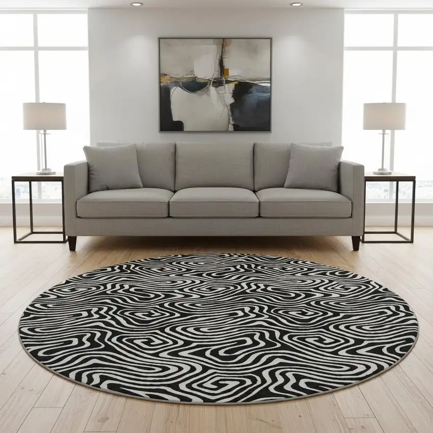 8' Black And Ivory Abstract Washable Round Rug With UV Protection Photo 2