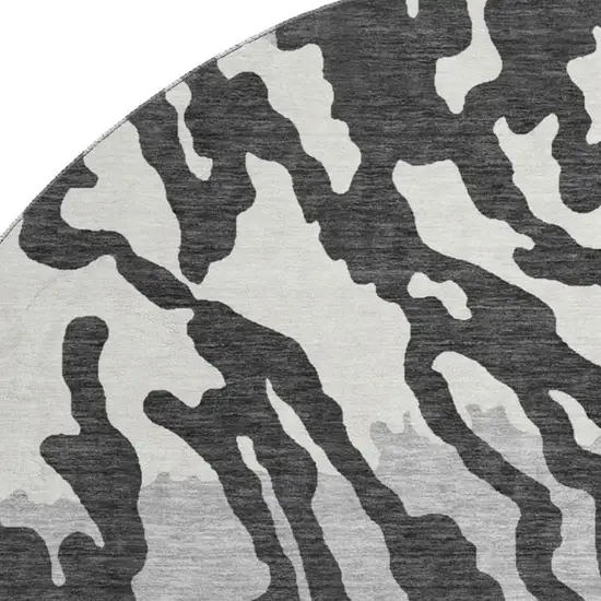 8' Black And Ivory Animal Print Washable Round Rug With UV Protection Photo 3