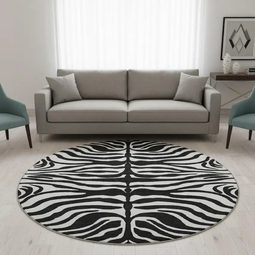 8' Black And Ivory Animal Print Washable Round Rug With UV Protection Photo 2